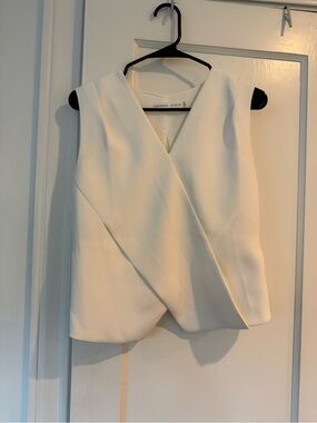 Sleeveless White Wrap-Front Structured Top